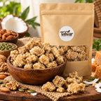 Organic dry fruit jaggery pieces in a wooden bowl with Talwar Organic Foods pouch