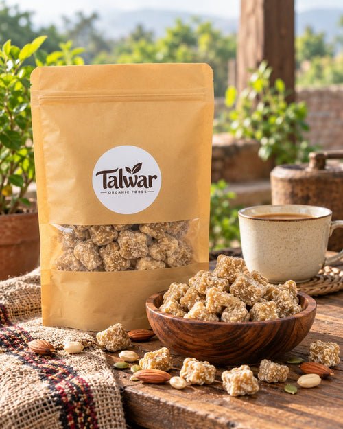 Talwar Organic Foods jaggery pouch with a bowl of jaggery and chai